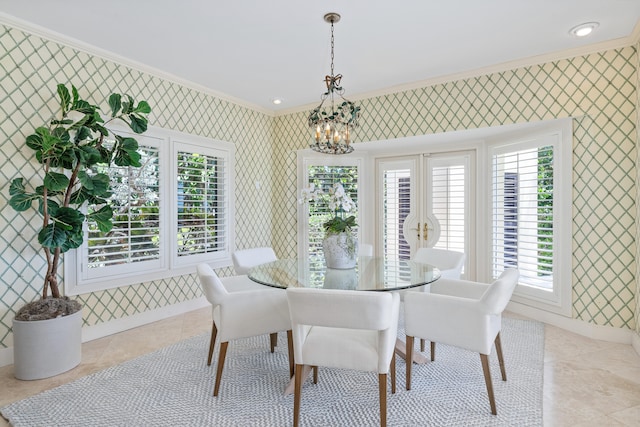 dining space featuring a notable chandelier, crown molding, and light tile floors