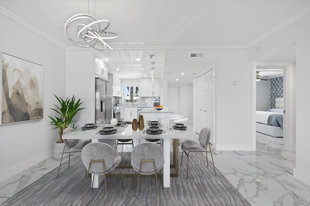 tiled dining area with ornamental molding and ceiling fan with notable chandelier