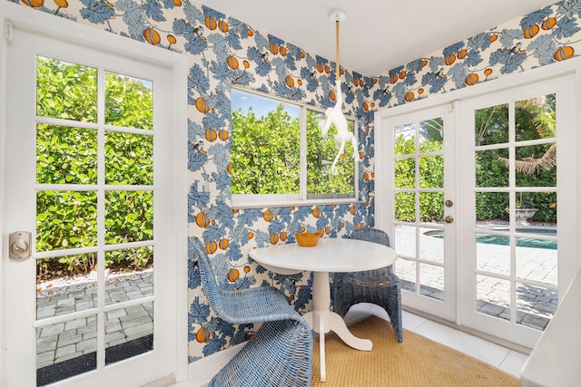 sunroom / solarium featuring a wealth of natural light