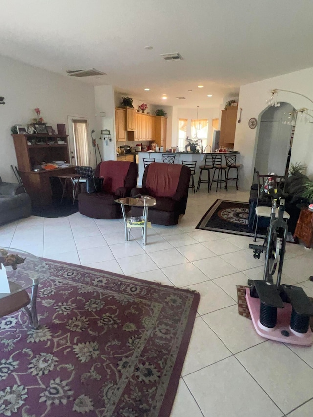 living room with light tile flooring