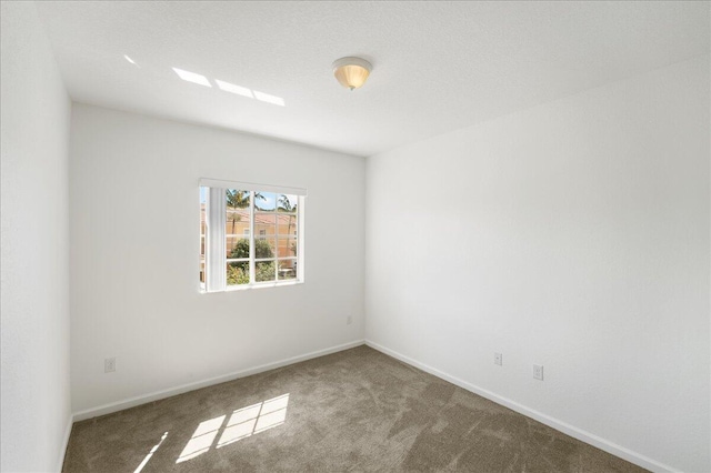 empty room with carpet floors