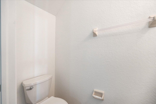 bathroom featuring toilet