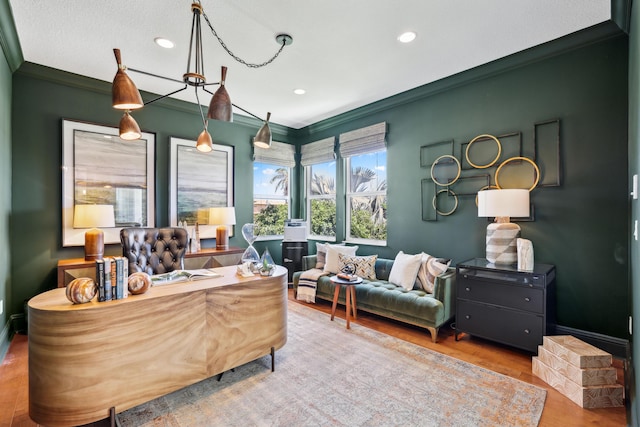 office area featuring hardwood / wood-style flooring and ornamental molding