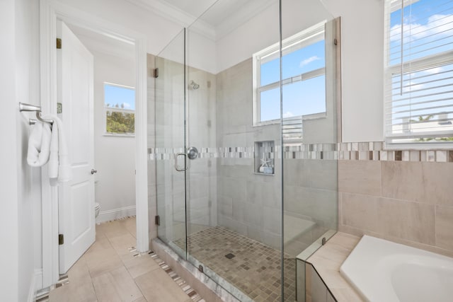 bathroom with toilet, tile patterned flooring, independent shower and bath, and ornamental molding