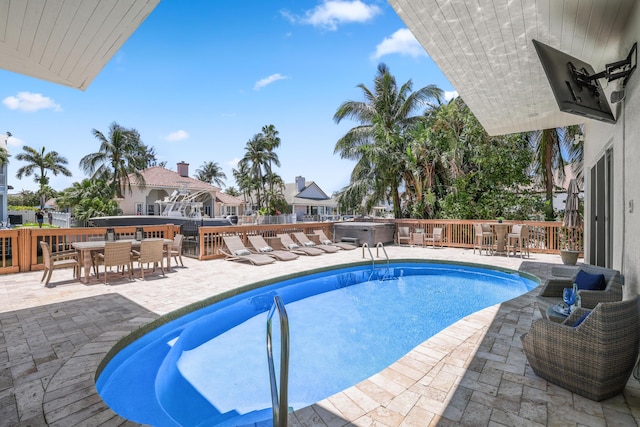 view of pool featuring a patio