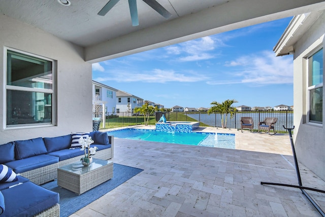 view of pool featuring ceiling fan, outdoor lounge area, and a patio