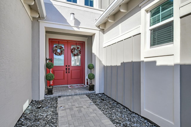 property entrance featuring french doors