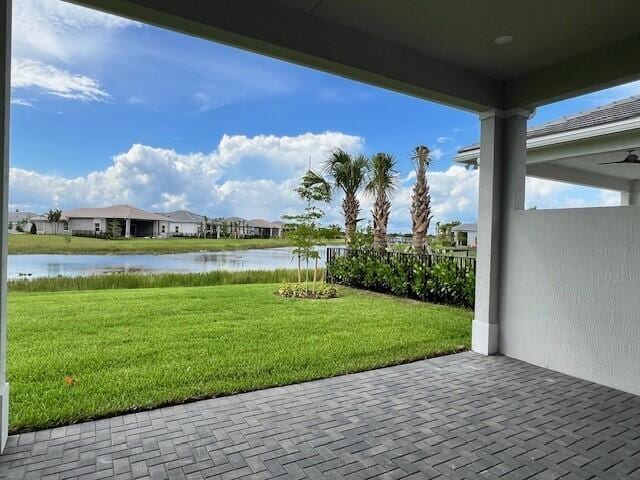 view of patio featuring a water view