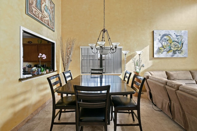 dining area with a notable chandelier