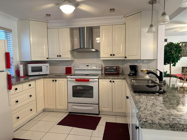 kitchen featuring wall chimney range hood, backsplash, ornamental molding, sink, and white appliances