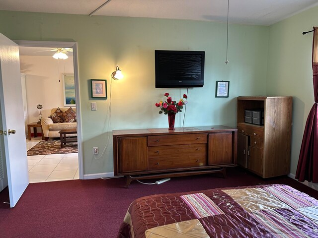 bedroom featuring light carpet