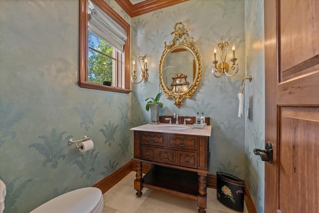 bathroom with crown molding, tile patterned flooring, vanity, and toilet