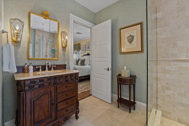 bathroom featuring a shower, vanity, and crown molding