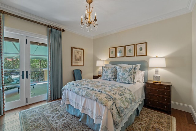 bedroom featuring access to exterior, hardwood / wood-style floors, an inviting chandelier, and ornamental molding