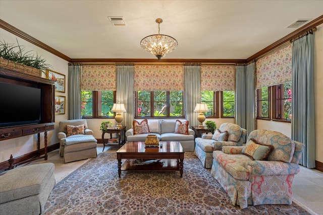 living room featuring crown molding and a chandelier