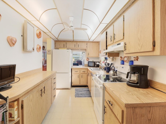 kitchen featuring white appliances, ceiling fan, light tile floors, and light brown cabinets