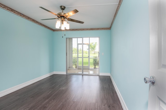 spare room featuring ceiling fan, crown molding, and dark wood-type flooring