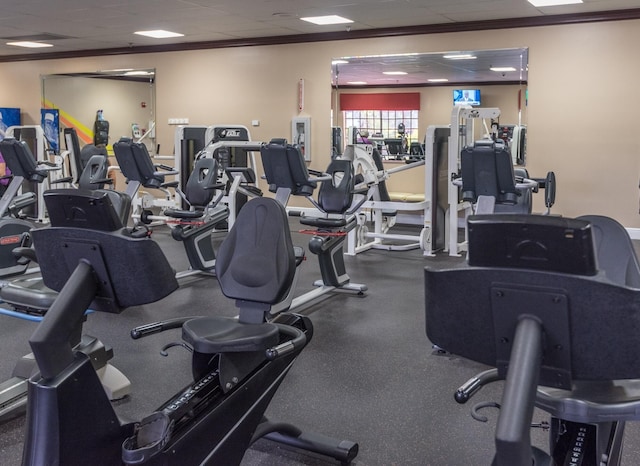 exercise room with ornamental molding