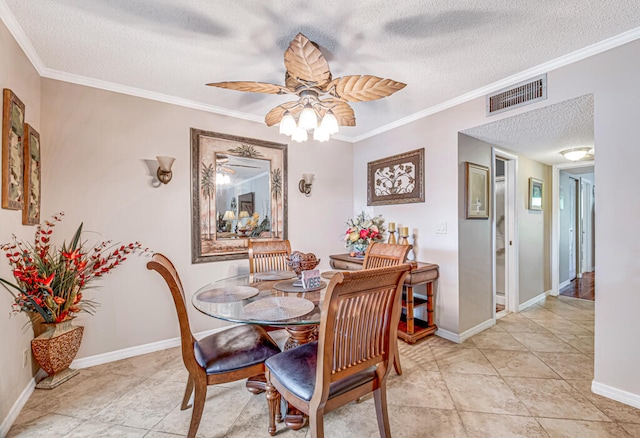 dining space with ornamental molding, ceiling fan, a textured ceiling, and light tile flooring