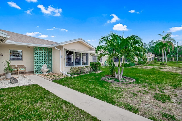 exterior space featuring a front yard