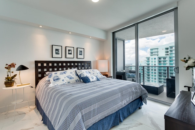 bedroom with tile floors, expansive windows, and access to outside