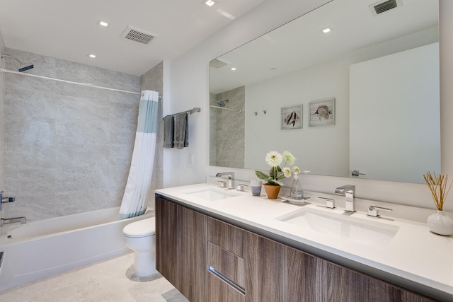 full bathroom with shower / bath combination with curtain, tile floors, toilet, and double sink vanity