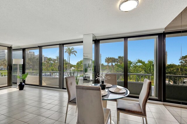 bird's eye view featuring a water view and a view of the beach