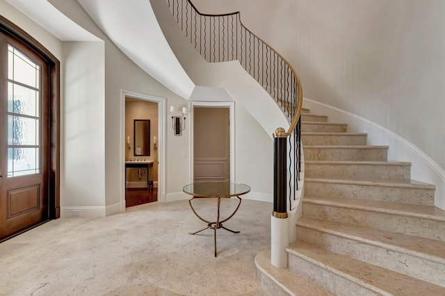 staircase featuring plenty of natural light