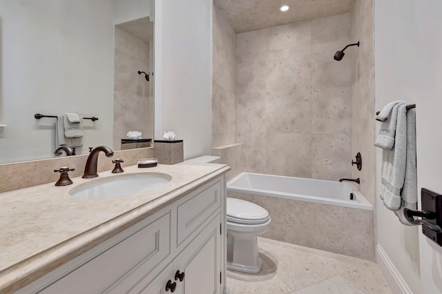 full bathroom featuring toilet, tile floors, tiled shower / bath combo, and oversized vanity