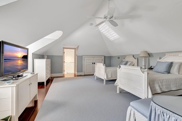 carpeted bedroom with lofted ceiling and ceiling fan