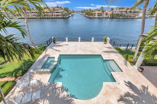 view of pool featuring a water view