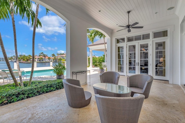 view of patio / terrace featuring ceiling fan