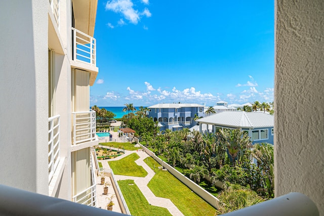 balcony featuring a water view