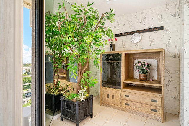 mudroom with light tile flooring