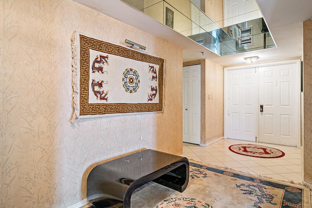 entryway with tile flooring