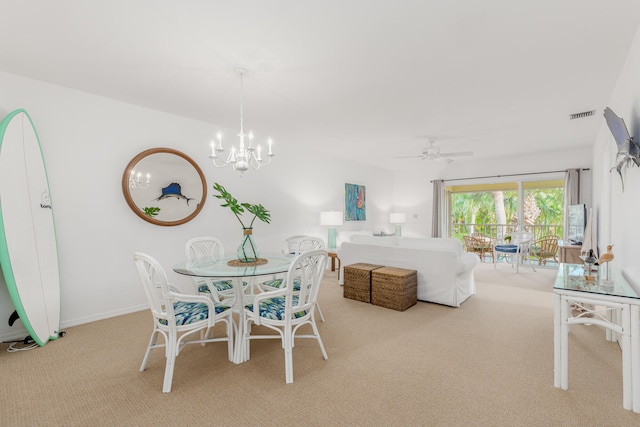 carpeted bedroom with a chandelier