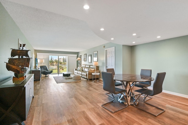 dining room with light hardwood / wood-style flooring