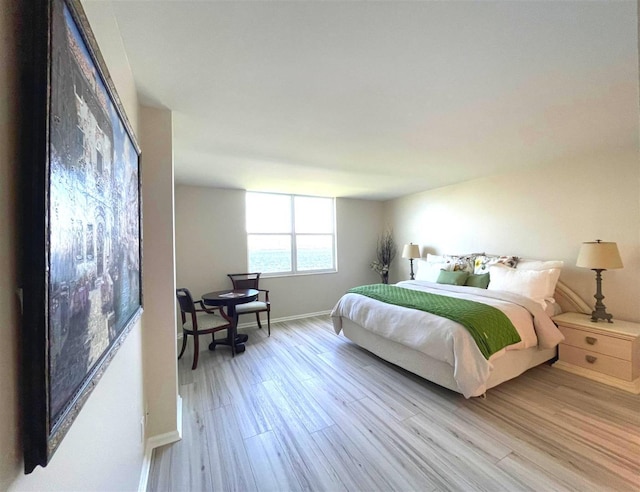 bedroom featuring light wood-type flooring