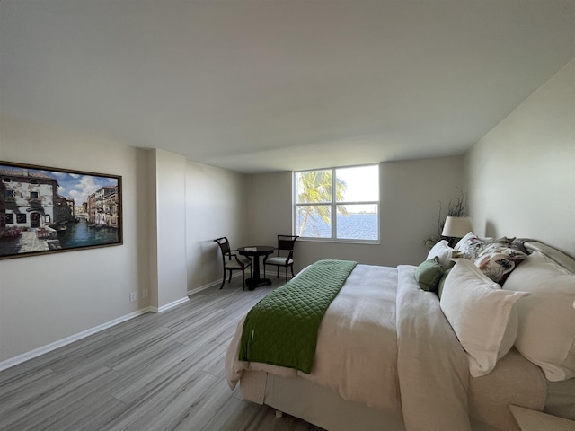 bedroom with light wood-type flooring