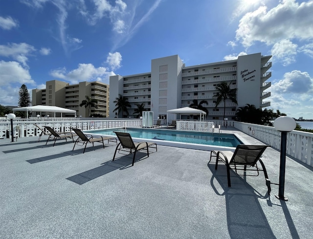 view of pool featuring a patio