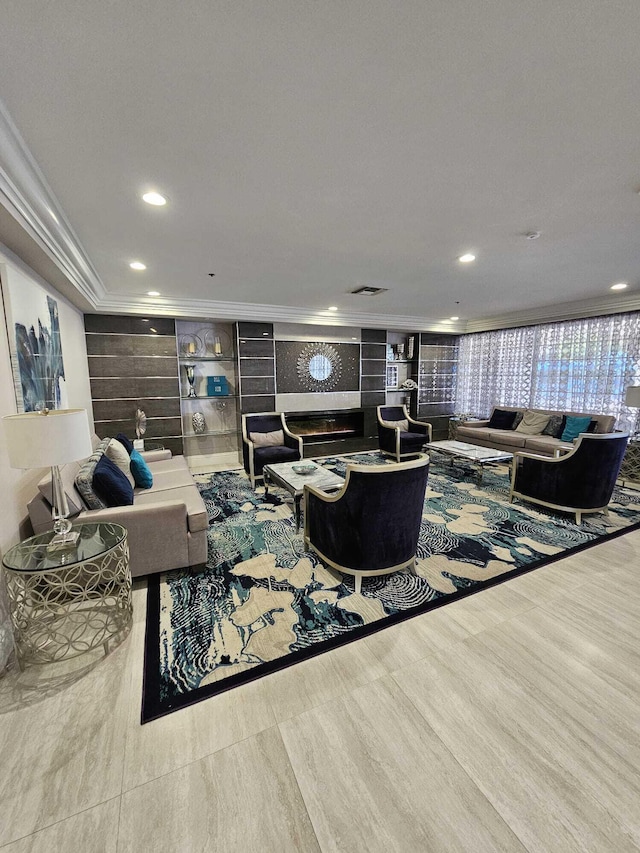 living room with built in shelves and crown molding