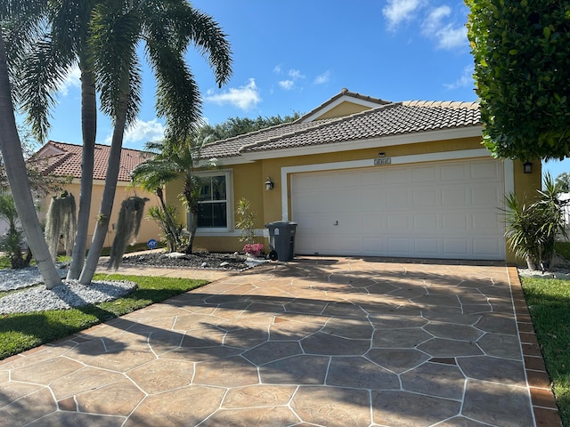 view of front of home with a garage