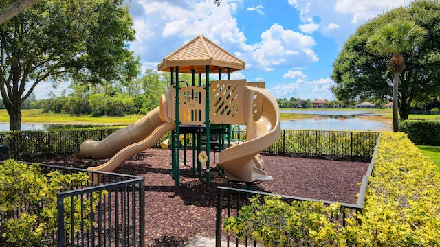 view of jungle gym with a water view