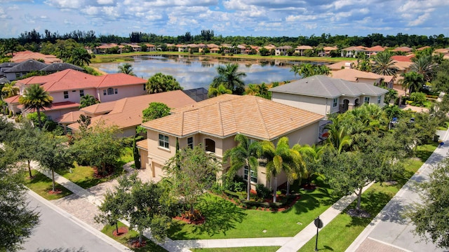 drone / aerial view with a water view