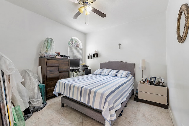 bedroom featuring light tile patterned floors and ceiling fan