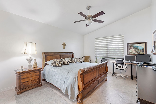 bedroom with light tile patterned floors, ceiling fan, and vaulted ceiling