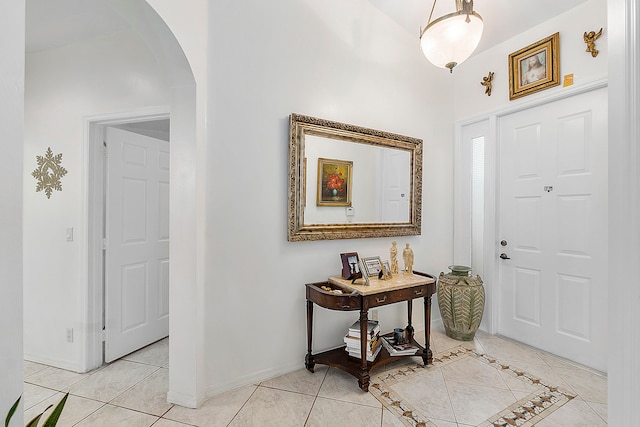 entrance foyer with light tile patterned floors