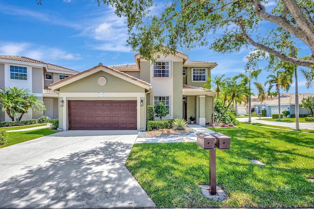 mediterranean / spanish house featuring a front yard