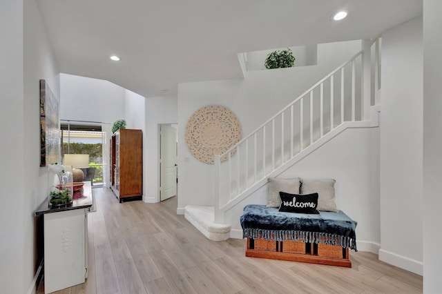 foyer entrance with light wood-type flooring