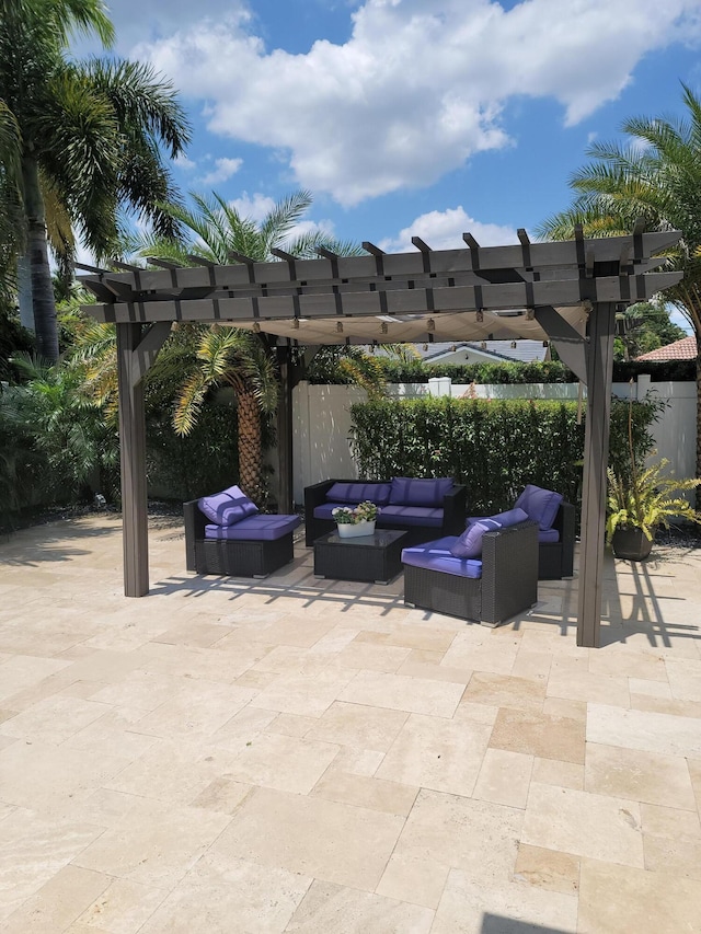 view of terrace with an outdoor hangout area and a pergola